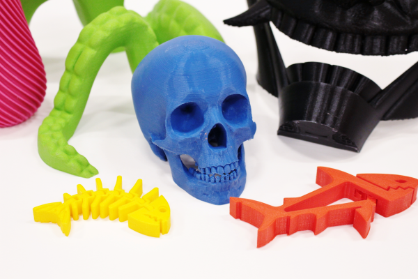 Colorful 3D-printed object such as human skull, fish bones, tentacles