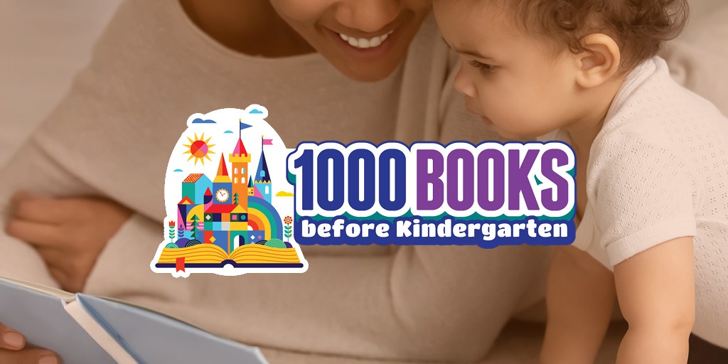 A close up photograph of a parent and infant looking at a book together with the logo for 1000 Books Before Kindergarten, a colorful castle next to the text, centered on top of the image