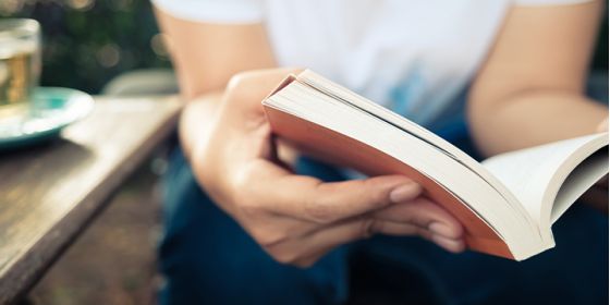 image of a person reading a book