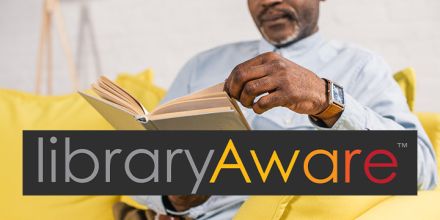 Library aware logo and a man reading a book